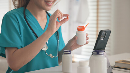 Asia woman people anti aging expert modern health care vlogger live advice talk selfie video mobile phone camera. Online retail diet weight loss digital virtual asian filming vitamin c pill drug store