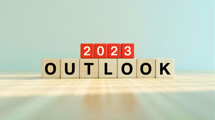 New Year 2023 Outlook on Wooden Blocks with Red and Black Letters on a Wooden Surface from a Slightly Elevated Viewpoint 3.jpg
