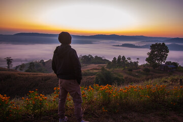 silhouette of a man on the mountain with view 