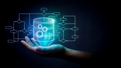 Hand Holding Glowing Database Server Structure with Data Flow Diagram on Dark Background
