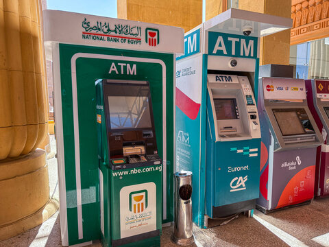 Sharm El Sheikh, Egypt - September 05, 2025: Egyptian ATM machines of National Bank of Egypt, Credit Agricole and Al Baraka used by tourists to withdraw cash