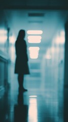 Hospital Vigil Silhouette of Woman Waiting Outside Operating Room Hallway