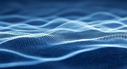 Abstract technology background with glowing blue particle waves moving across dark surface creating digital data flow concept and advanced computing visualization