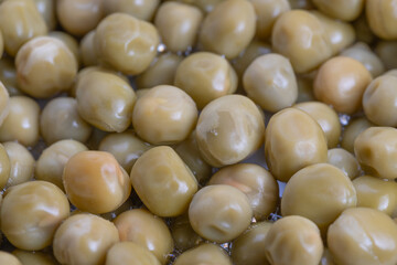 Closeup of canned peas for nutritional analysis presentation, Detailed display of canned peas...