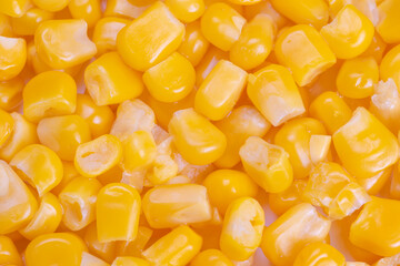 Detailed glossy sweet corn kernels styled for editorial use with reflective highlights and...