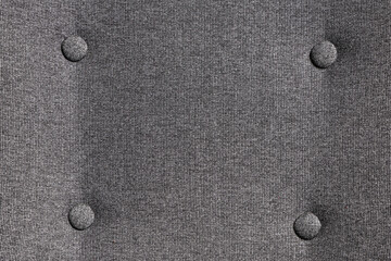 Upholstery fabric with tufted buttons as background