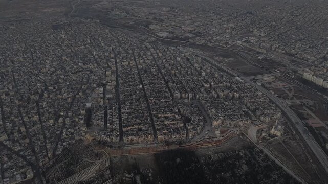 Drone shot of Syria showing buildings destroyed by the war, infrastructure and reconstruction.