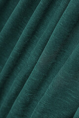 Fototapeta premium Green cotton fabric as background