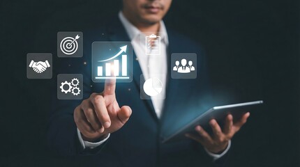 A businessman interacts with a digital interface, analyzing data and strategy for business growth and success.