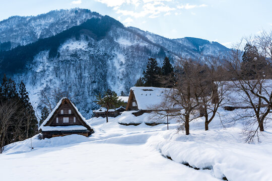The serene and historic gassho-zukuri village of Ainokura, a UNESCO World Heritage site in Gokayama region, blanketed in winter snow. Toyama, Japan.