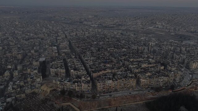 Drone shot of Syria showing buildings destroyed by the war, infrastructure and reconstruction.