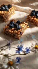 Baked Oatmeal Squares with Blueberries Cornflowers Beige Background