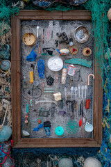 Ocean debris artifact: An assembly of discarded plastics and objects recovered from the ocean,...