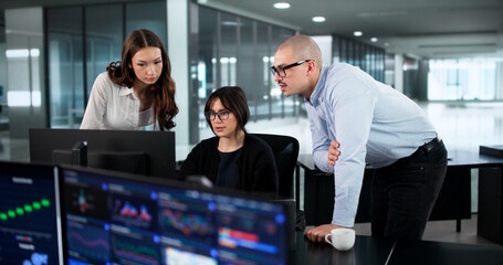 Collaborative Team Of Marketing Analysts Analyze Business Performance Metrics
