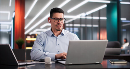 Fototapeta premium Hispanic Professional Attending Virtual Business Conference