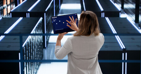 Young Woman Investigates Online Attacks Using Cybersecurity Dashboard