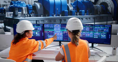 Female SCADA Engineer Monitors Gas And Oil Industry Operations © Andrey Popov