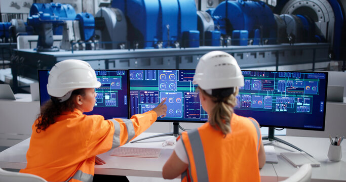 Female SCADA Engineer Monitors Gas And Oil Industry Operations