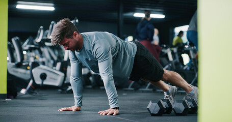 Fitness, plank and man in gym, exercise and routine to improve posture, bodybuilding or health...