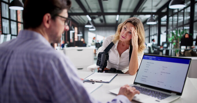 Worker And Lawyer Discuss Compensation For Injury, Disability Application