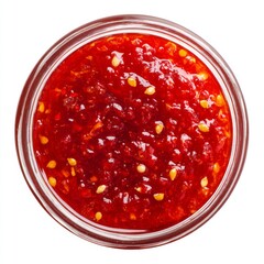 Vibrant Red Chili Sauce in a Glass Jar with Visible Seeds and Rich Texture Ideal for Culinary Use and Food Photography