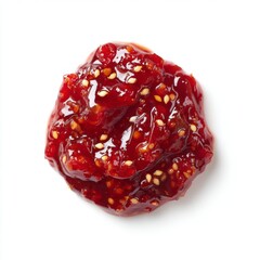 Bright and Glossy Red Chili Sauce with Texture and Seeds Piled on White Background