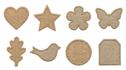 Burlap fabric patch set including heart star flower butterfly leaf bird circle and tag shapes isolated. Rustic textile element collection for crafting and scrapbooking.