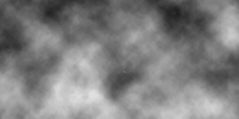 Abstract motion of white smoke and mist swirling against a dark black background creates a dramatic cloudscape texture reminiscent of a storm explosion in the night sky © MRIDUL