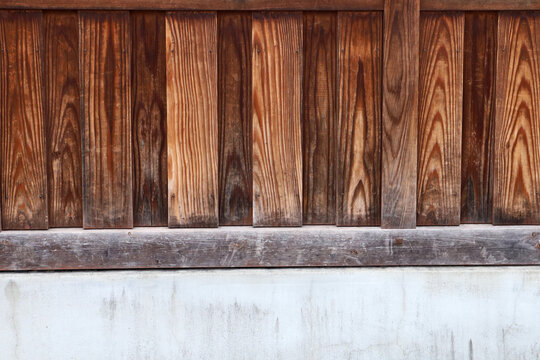Wooden with concreat wall for background.