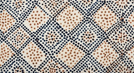 Close-up of a geometric pattern with small black, white, and brown dots arranged in