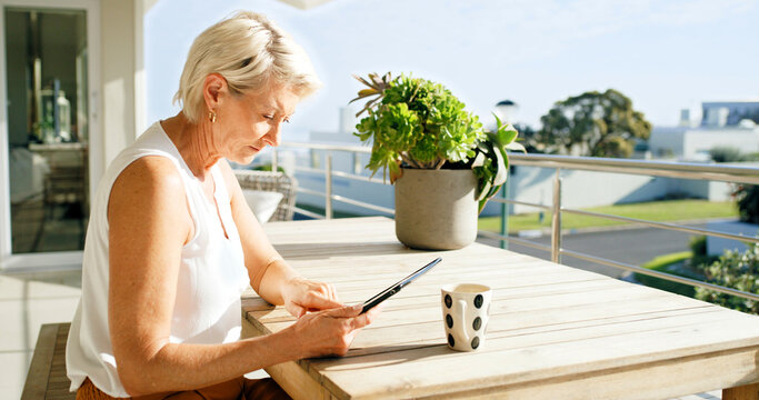 Balcony, relax and tablet with senior woman at apartment for break, retirement or social media. App, coffee and home with old person outdoor on veranda for fresh air, me time or online planning