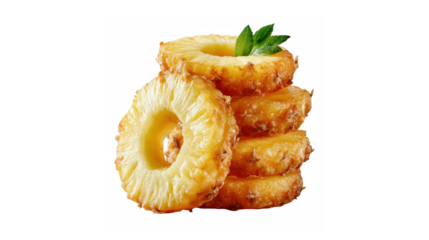 Golden fried pineapple rings stacked with fresh mint leaves