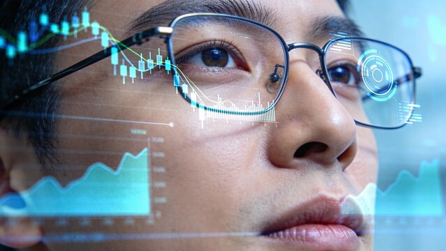Man with glasses and financial data overlay - Powered by Adobe