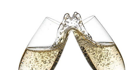 Two champagne glasses clinking together creating a celebratory splash of sparkling wine.