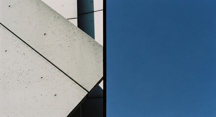 Obraz premium Abstract Architectural Detail Against a Clear Blue Sky.