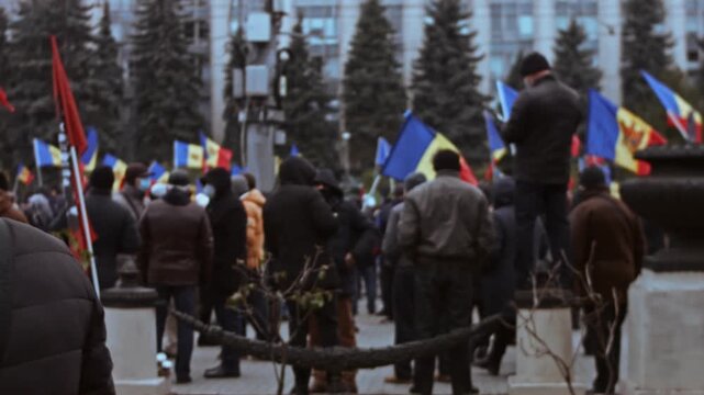 Chisinau, Republic of Moldova - December 06, 2020: Moldovan citizens with national flags gathered in peaceful protest against the government