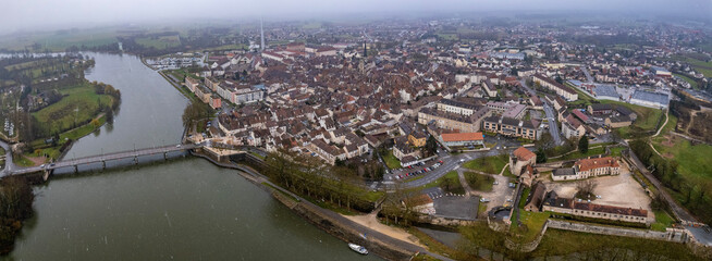Aerial panoramic view of the old town city Auxonne in France on a cloud morning