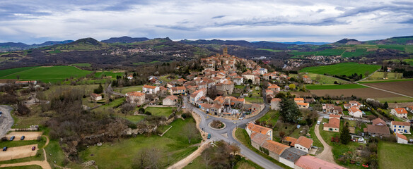 Aerial panoramic view of the old town city Montpeyroux in France on a sunny day