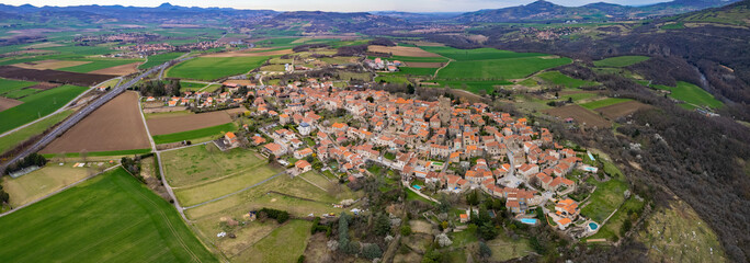 Aerial panoramic view of the old town city Montpeyroux in France on a sunny day