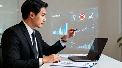 Businessman Analyzing Digital Charts