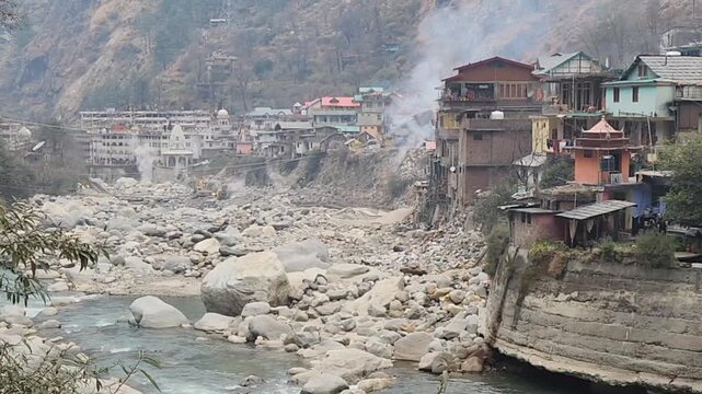 Holy Manikaran Hot Springs with Steam and Manikaran Sahib Gurudwara View