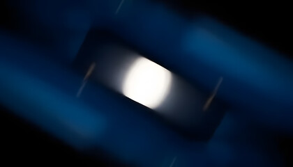 Abstract Blue Motion Background with Soft White Light Glow.