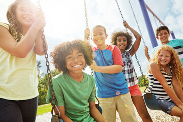 Portrait, smile and kids with friends at playground for playtime, activity and bonding together. Below, children and playing on swing for fun, group reunion and weekend break for holiday trip at park