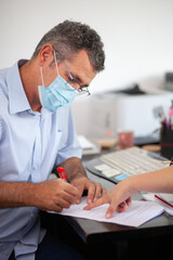 Accountant Consulting Client in Office