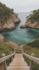 Wooden Staircase Descending to a Secluded Turquoise Cove Surrounded by Rocky Cliffs and Lush Greenery, Overcast Sky...