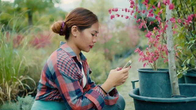 Woman Gardening with Smart phone in Hand