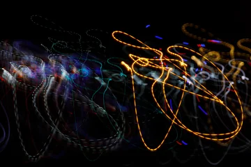 Fototapete Fraktale Wellen Abstract background, colored lines on black background  © AlexTow