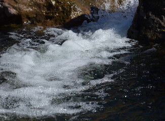 Gran Canaria, moving water, rainwater is feeding the small streams and cascades in Winter after storms © Tamara Kulikova