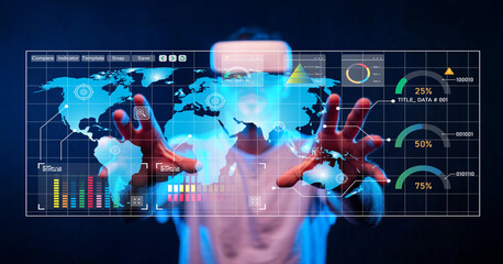 Futuristic business person interacting with a holographic digital interface displaying global data analytics and statistics for modern technology concepts