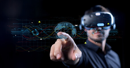 Person using virtual reality headset with digital interface and globe, exploring technology, innovation, and immersive experiences in a modern setting